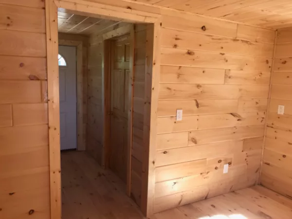 We have log cabins for sale near Manistee MI.